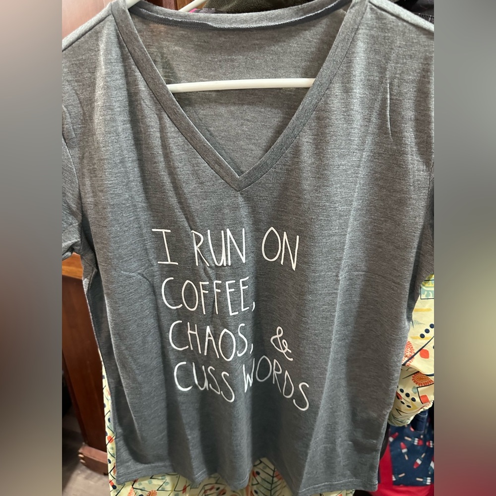 I run on coffee, chaos, and cuss words